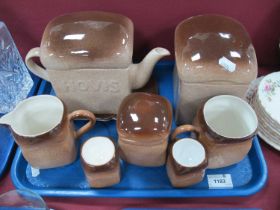 Carlton Ware 'Hovis' Teapot on Stand, biscuit jar, jug, mug, sugar bowl, two egg cups:- One Tray