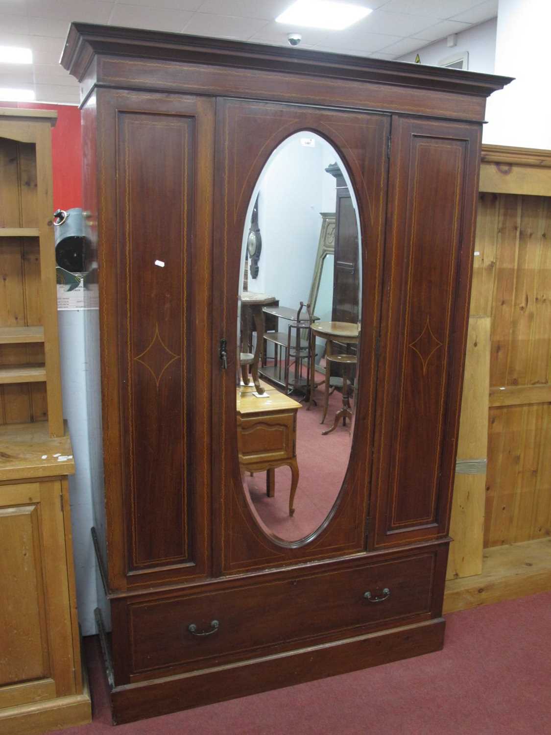 An Edwardian mahogany inlaid wardrobe with single mirrored door over long drawer, on a plinth - Image 3 of 3