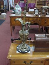 A Gilded Brass Table Lamp, in the form of a Ewer, on a grey marble circular base, 75cm high.