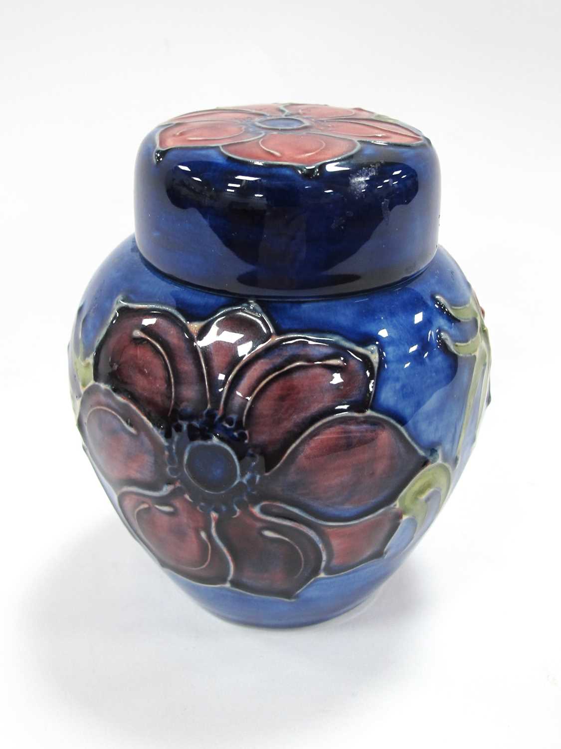 Moorcroft Anomonies Giner Jar, on blue background, 11cm high.