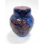Moorcroft Anomonies Giner Jar, on blue background, 11cm high.