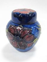 Moorcroft Anomonies Giner Jar, on blue background, 11cm high.