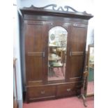 Early XX Century Two Door Wardrobe, with a central mirror, base with two short drawers, 138cm wide.