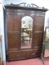 Early XX Century Two Door Wardrobe, with a central mirror, base with two short drawers, 138cm wide.