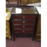 1920's Mahogany Music Cabinet, with four fall front drawers and shaped low back, 53cm wide.