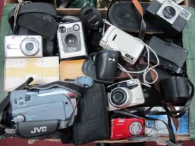 A collection of cameras and lenses from makers such as Chinon, Tamron, LUMIX, Brownie, Cosmic, JVC