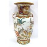 Oriental - XIX Century Baluster vase with fluted neck and handles in the form of elephants,