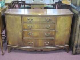 XX Century mahogany bow fronted sideboard with four central drawers, flanking cupboards on bracket