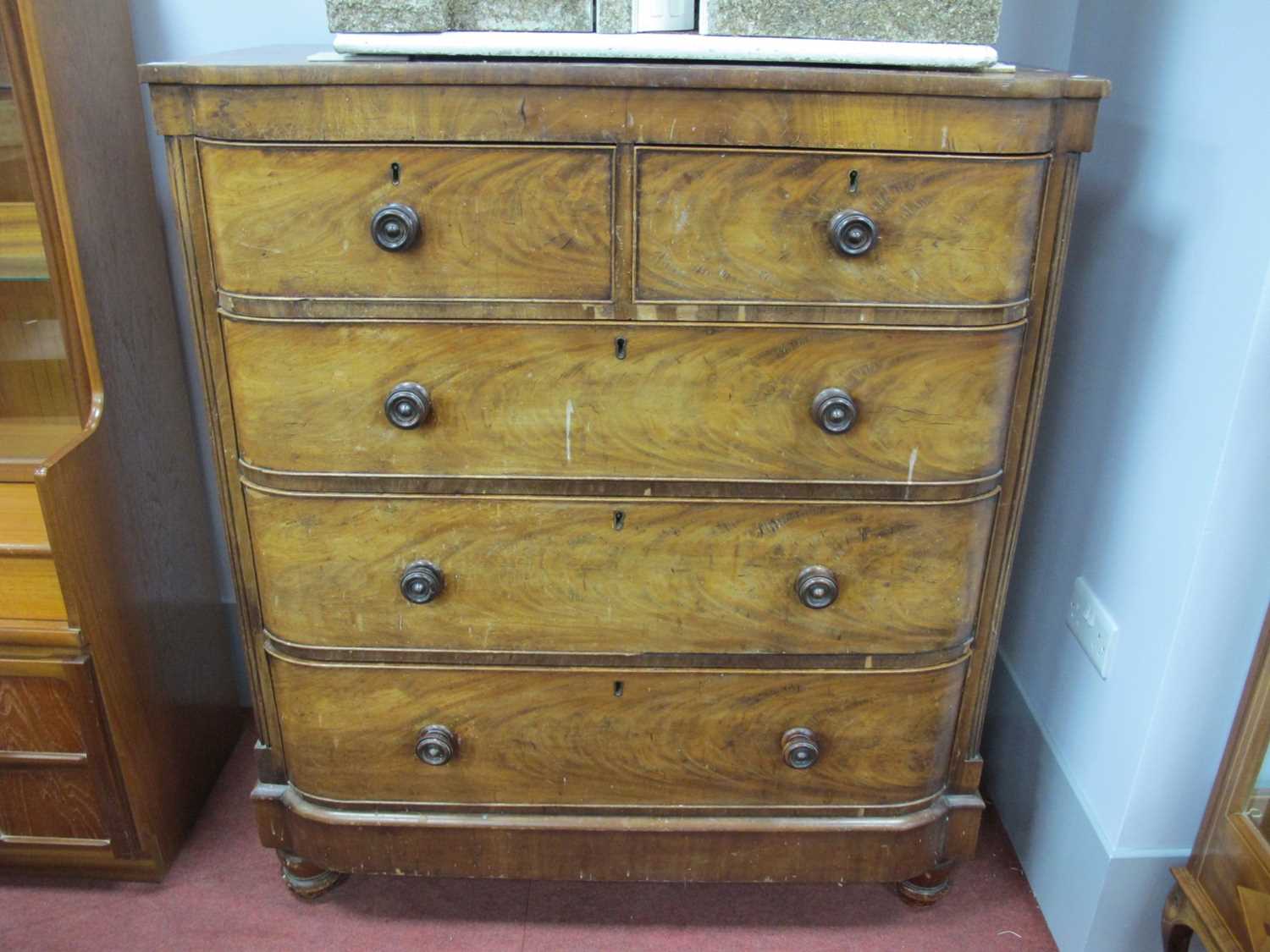 XIX Century Mahogany Chest of Drawers, with two short drawers, three long drawers, on turned feet