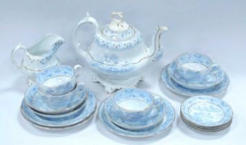An early Victorian part tea service circa 1850 comprising of teapot, teacups and saucers, side