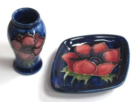 A Miniature Moorcroft Vase, painted in the 'Anemone' pattern on a blue ground, 5cm high and a