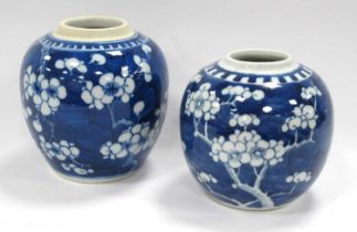 Two Chinese ginger jars both painted with blue and white flower patterns. (2) One jar has been