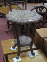 Japanese Plant Table, carved with monkeys in naturalistic setting to octagonal top and undershelf on