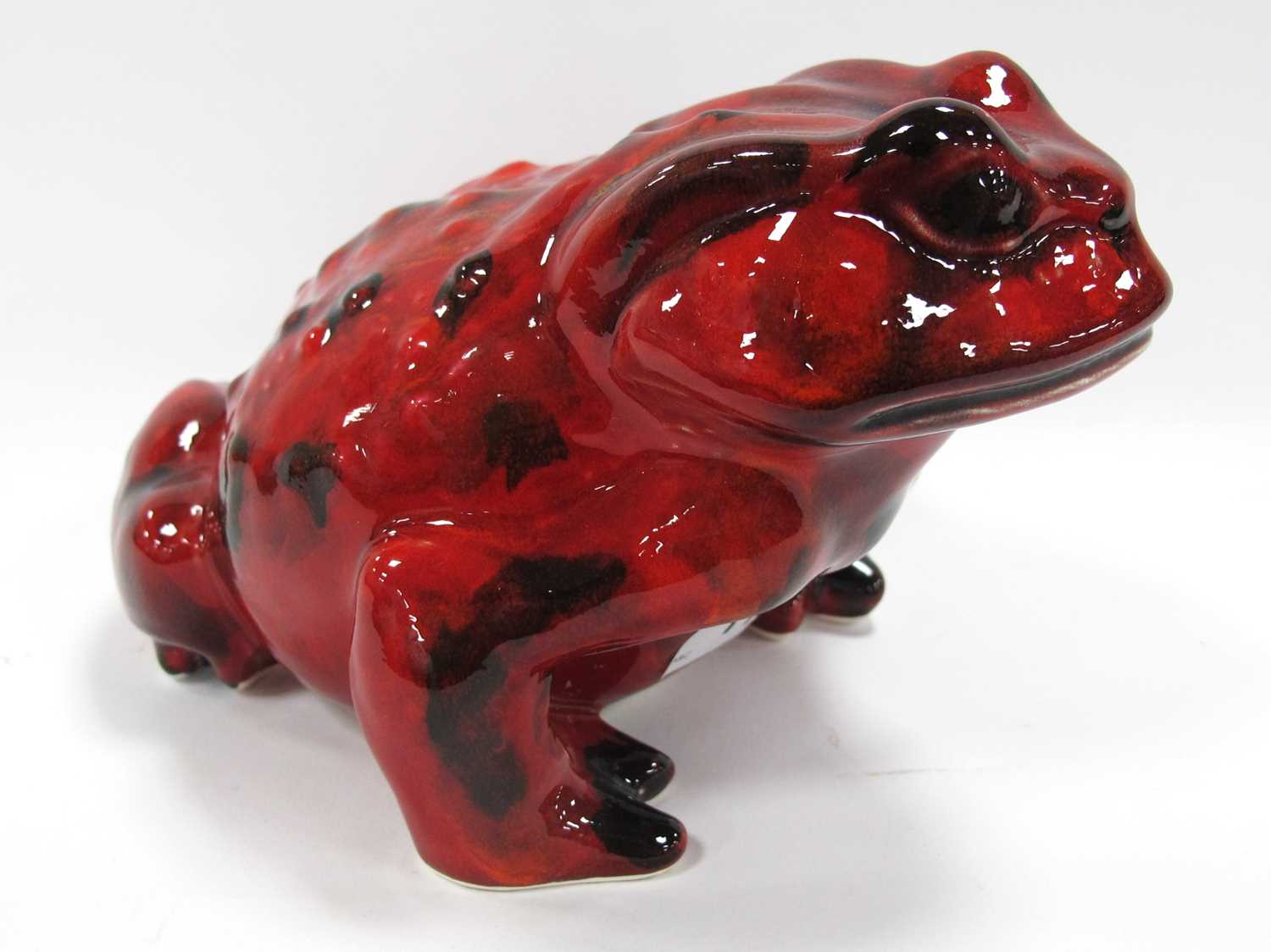 Anita Harris Flambé Model of a Toad, gold signed, 11.5cm high, 18cm long.