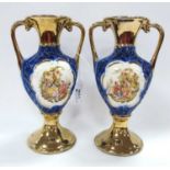 A Pair of Twin Handled Porcelain Vases, 24.5cm high.