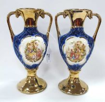 A Pair of Twin Handled Porcelain Vases, 24.5cm high.