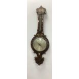 A Late XIX Century Banjo Barometer, the rosewood case inset with mother of pearl and metal wire with