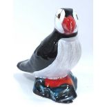 Anita Harris Model of a Puffin, in reactive glazes and enamels, gold signed, 13.5cm high.