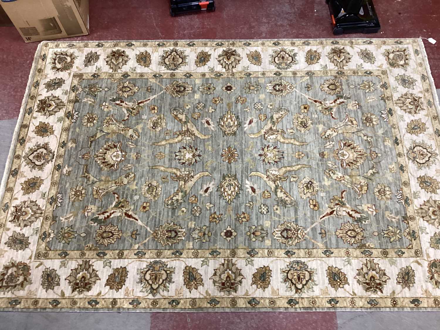 Indian Wool Rug 'Gazni' with foliate design, bearing label 'Oriental Rug Shop', 244 x 165cm.