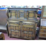 Taylor & Entwistle of Leeds, Oak Buffet Sideboard Circa 1930's, with canted upper cupboard doors,