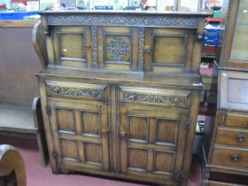 Taylor & Entwistle of Leeds, Oak Buffet Sideboard Circa 1930's, with canted upper cupboard doors,