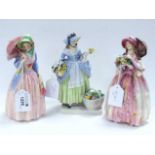 Royal Doulton Figurines 'Miss Demure', 'Spring Flowers' and June (body damaged). (3)