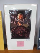 Queen, Roger Taylor Autograph, blue pen signed (unverified) on pink paper, with image, as an