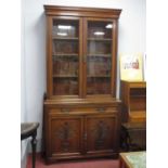 Early XX Century Mahogany Bookcase, with a stepped pediment, twin glazed doors, four internal