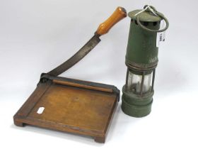 A Painted Miners Lamp, and an early XX Century guillotine paper trimmer (2).