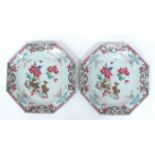 A Pair of Late XVIII Century Chinese Porcelain Chargers, of octagonal form, painted in the famille
