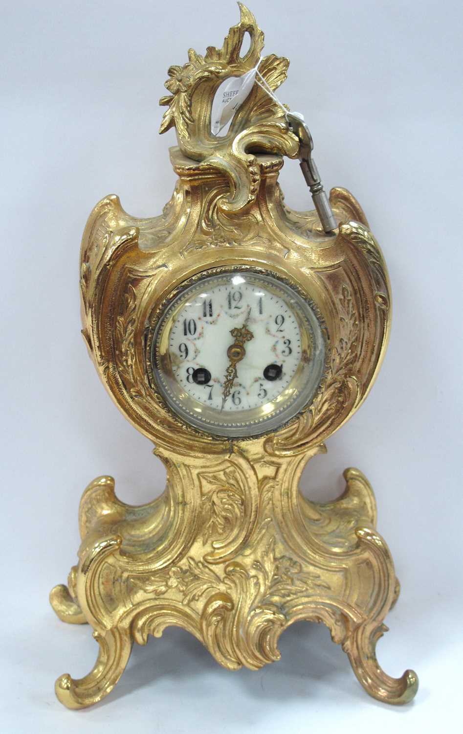 A Late XIX Century French Mantle Clock, the ornate ormolu case cast with scrollwork and flowers, the - Image 2 of 2