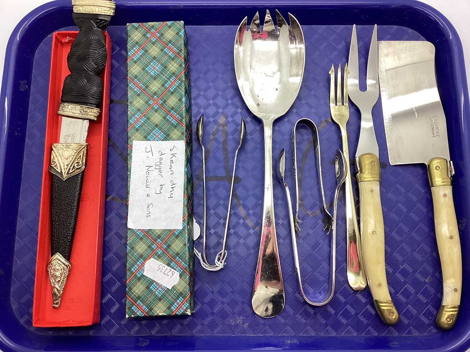 A J. Nowill & Sons Ltd (Sheffield) Skean-Dhu, in original box; together with plated sugar tongs,