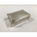 Military Interest; A Hallmarked Silver Cigarette Box, London 1917, of plain rectangular form, the