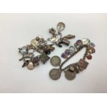 A Vintage Curb Link Charm Bracelet, with assorted charms including enamel, souvenir, articulated,