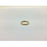 A 22ct Gold Plain Wedding Band, (worn) (finger size L 1/2) (2grams).