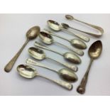 A Set of Seven Hallmarked Silver Teaspoons, London 1893, foliate engraved and initialled, together