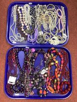 Assorted Costume Bead Necklaces, in pinks, purple, white and reds :- Two Trays