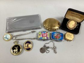 A Pair of Hallmarked Silver Sugar Tongs, together with a Kigu musical compact, pill boxes, brooches,