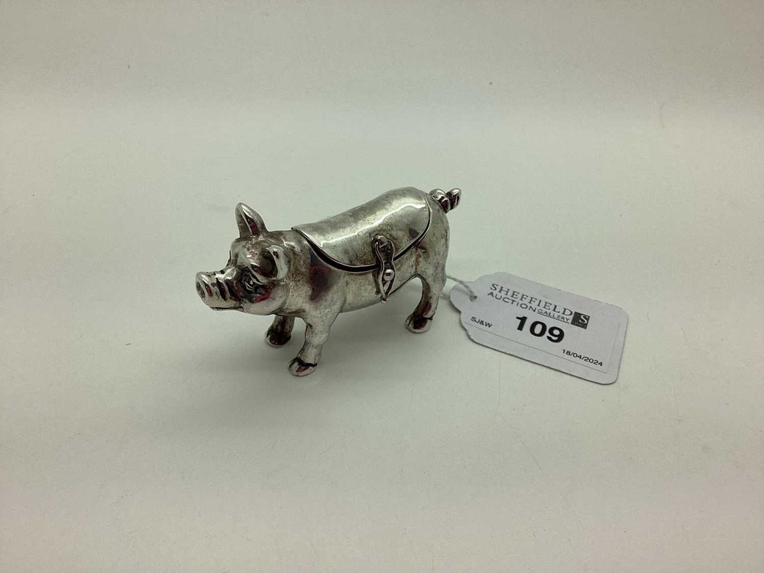 A Modern Novelty Box in The Form of A Pig, with hinged lid to back, overall length 7.6cm.