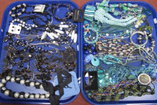 A Selection of Modern Costume Jewellery, in hues of black, blues and greens, including large bead