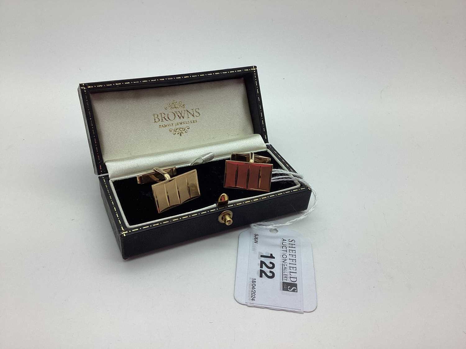 A Pair of 1960's 9ct Gold Cufflinks, the textured rectangular panels on swivel bar backs (