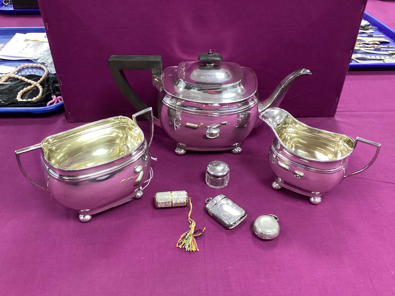 HB&H Plated Three Piece Tea Set, together with a plated vesta case, a small hallmarked silver topped