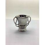 A Stylish Hallmarked Silver Twin Handled Vase, HW, Sheffield (date letter rubbed), of plain tapering