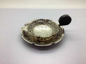 A Middle Eastern Style Strainer on Stand, of shaped design detailed with elephant and seated