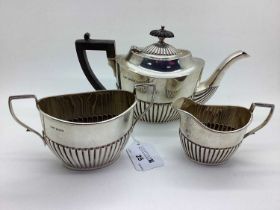 A Hallmarked Silver Three Piece Bachelors Tea Set, JR, Sheffield 1918, each of oval semi reeded