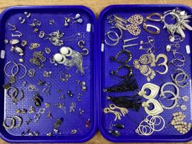 A Collection of Assorted Modern Costume Earrings, including hoops, drops, studs etc :- Two Trays