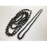 Long Victorian Bead Necklace, knotted with black painted clasp (overall length 172cm); a French