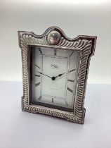 A Modern Hallmarked Silver Mounted Clock, R Carr, Sheffield 1994, of shaped rectangular form,