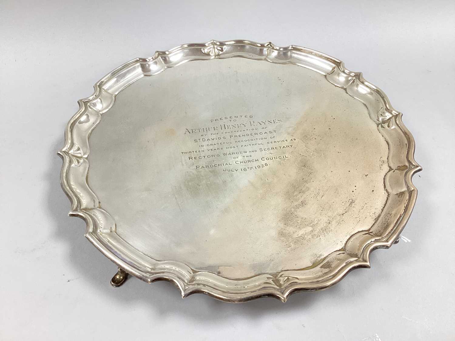 A Chester Hallmarked Silver Salver, HEB FEB, Chester 1925, of shaped circular form, engraved "