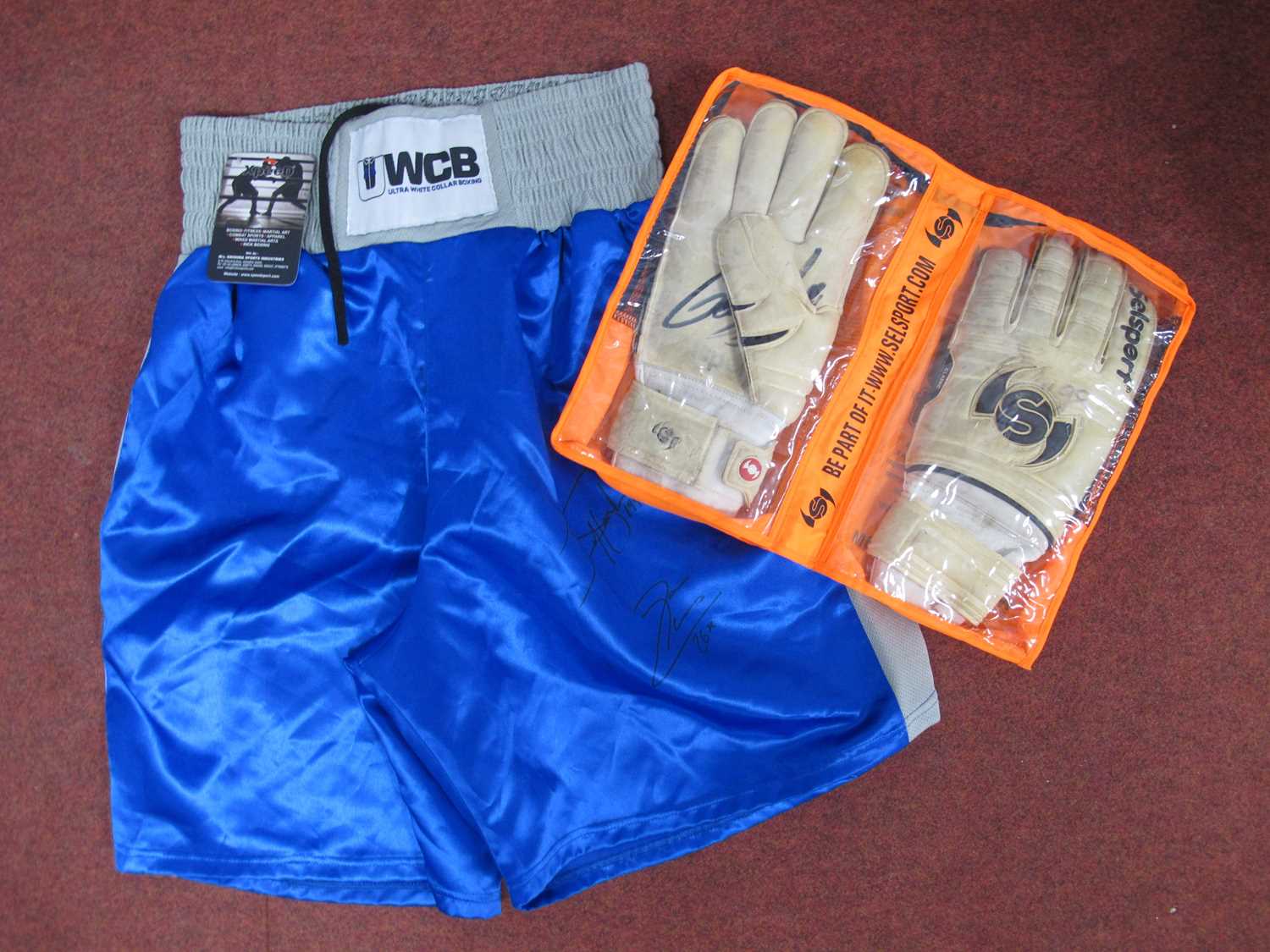 Geroge Long Autographed Selsport Goalkeeper Gloves (unverified). UWBC boxing shorts, bearing two